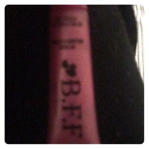 A pink red apple blossom lips gloss